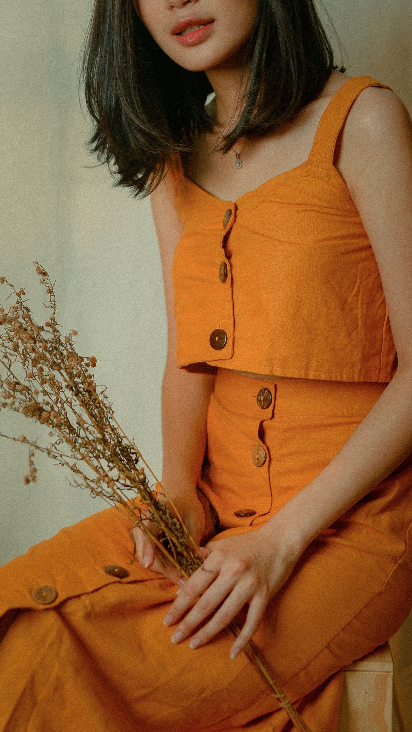 Woman in Orange Casual Dress